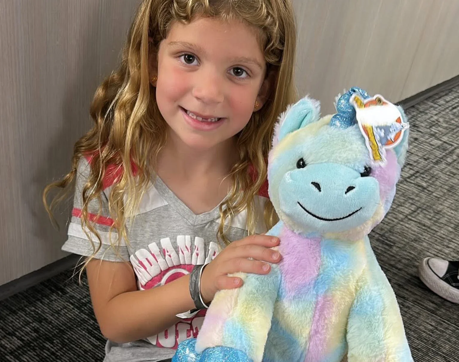 Girl at camp with stuffy