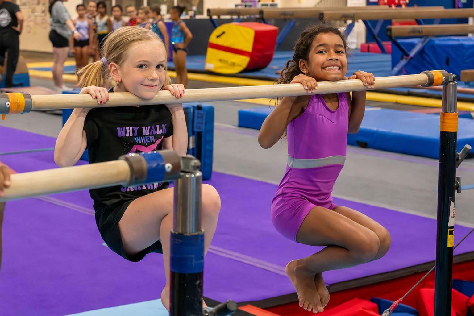 Two girls in gymnastics class