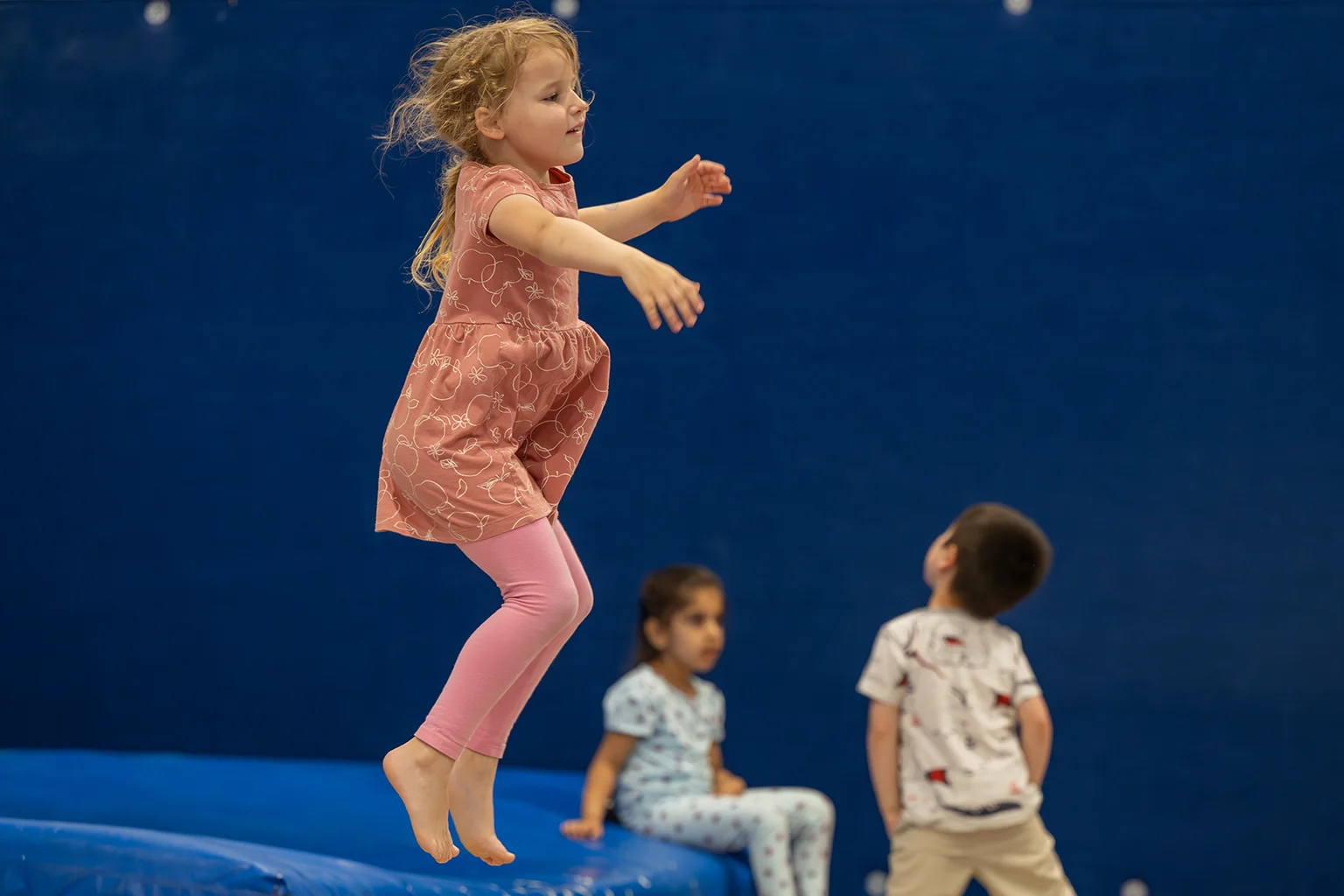 Girl jumping at camp